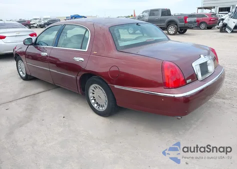 2002 Lincoln Town Car Cartier/Cartier Prem. z USA, uszkodzony, nr VIN 1LNHM83W52Y626407